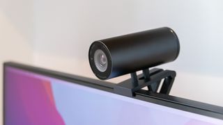 Dell UltraSharp Webcam affixed to top of laptop