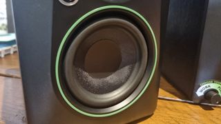 The 3.5-inch driver of a Mackie CR3.5 BT speaker in close up