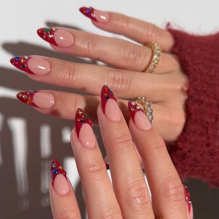 glittery red french tip manicure