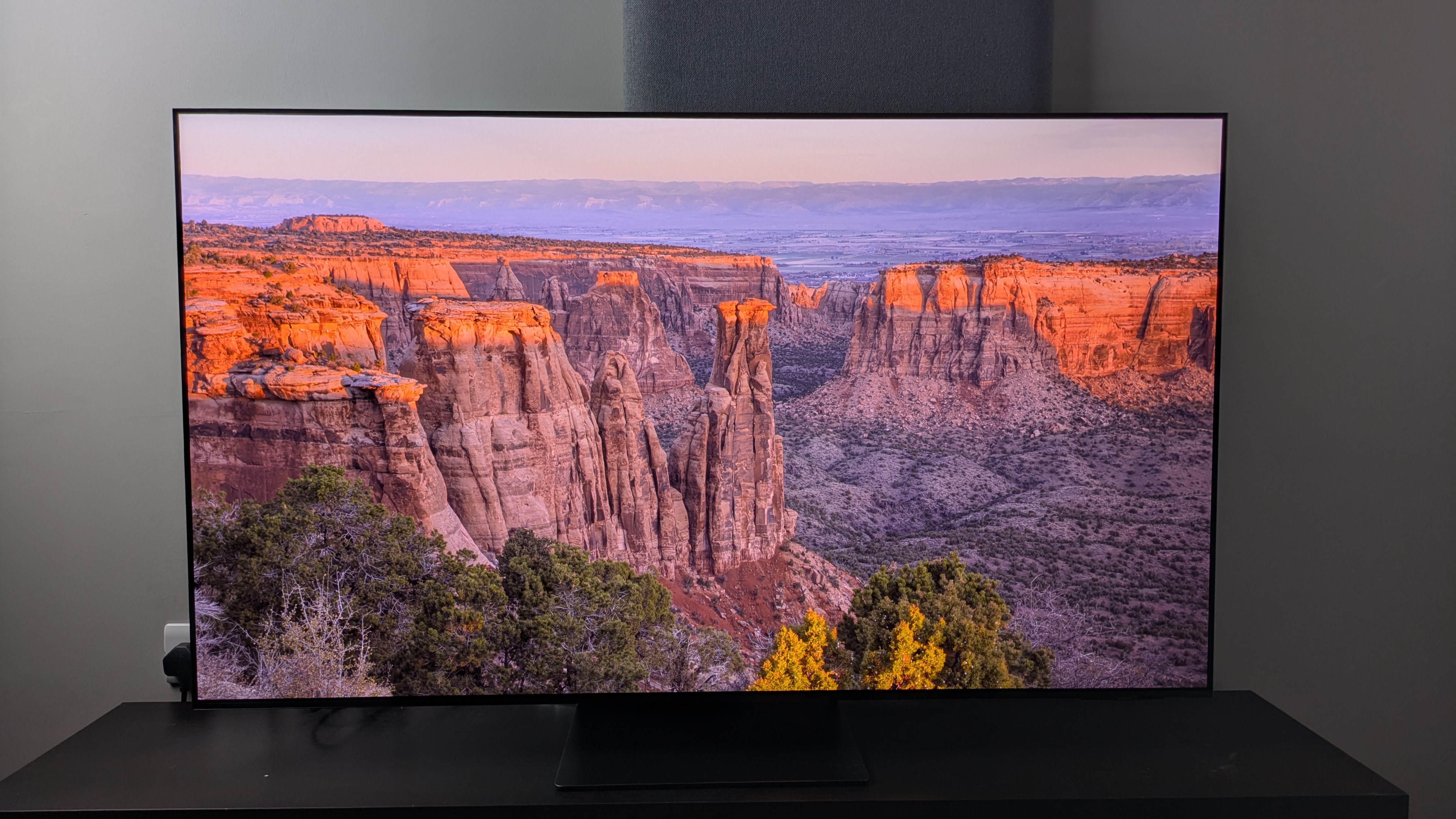 Samsung S95F with canyon on screen