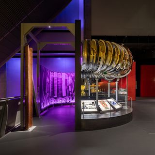 purple and yellow hues in Science Museum Energy Revolution gallery by Unknown Works