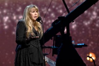Stevie Nicks on stage with Fleetwood Mac.