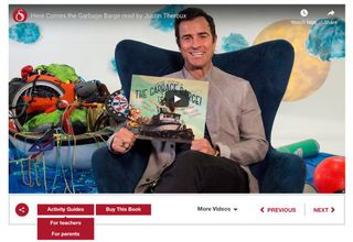 Screenshot of Justin Theroux holding "Here Comes the Garbage Barge"
