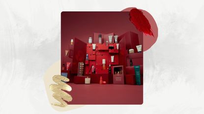 Image of burgundy LookFantastic Beauty Advent Calendar 2025 with its contents stacked on top of it, on a white marbled background with cream and burgundy circle graphics, a red lipstick swatch and gold glitter eyeshadow swatch