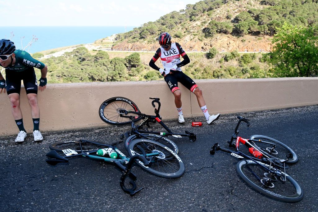 PERPIGNAN FRANCE MARCH 22 LR Roger Adri Oliveras of Spain and Team Equipo Kern Pharma and Marc Soler Gimenez of Spain and UAE Team Emirates after crash during the 101st Volta Ciclista a Catalunya 2022 Stage 2 a 2024km stage from LEscala to Perpignan VoltaCatalunya101 WorldTour on March 22 2022 in Perpignan France Photo by David RamosGetty Images
