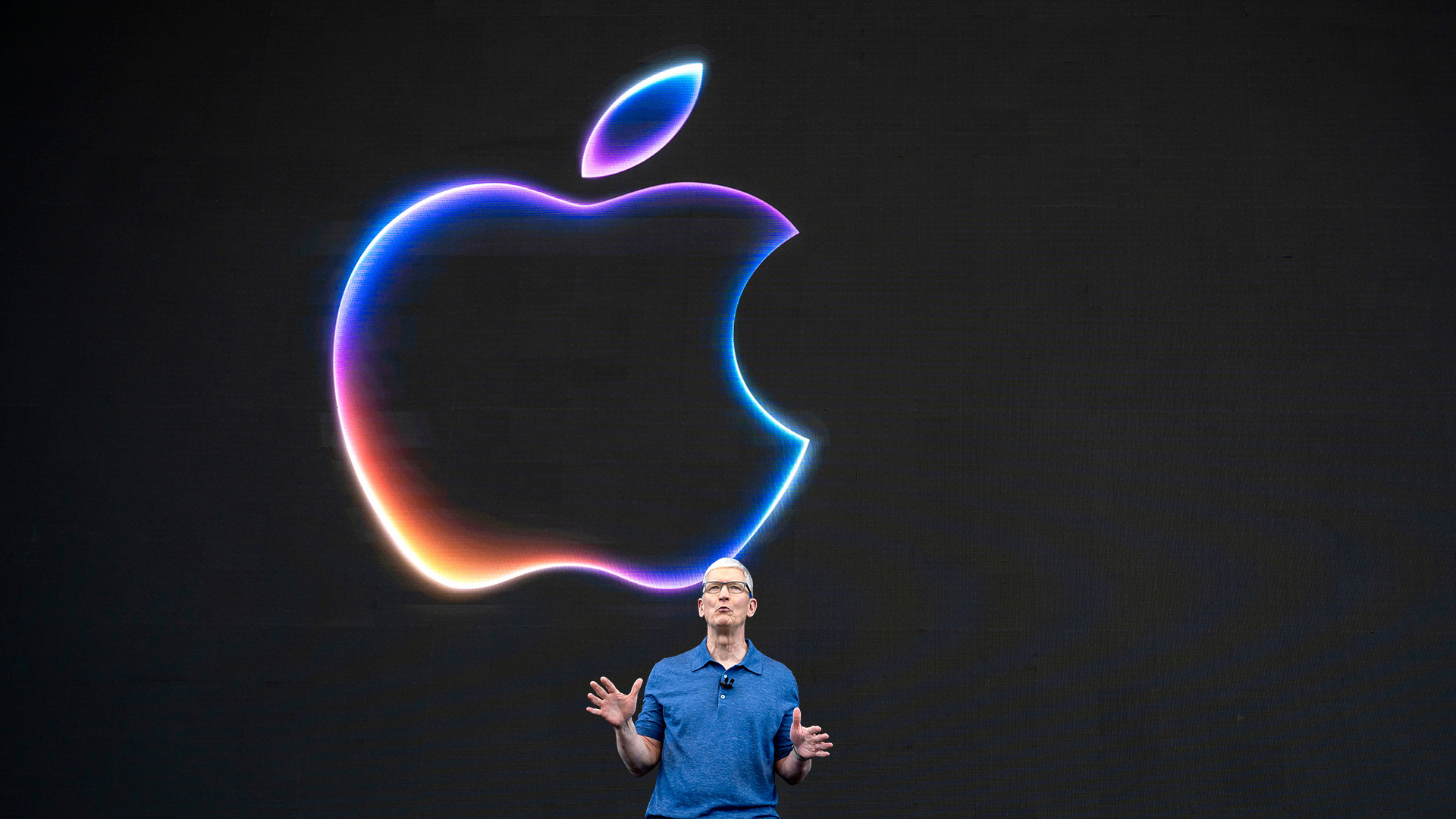 WWDC 2024 – Steve Jobs on stage in front of Apple logo