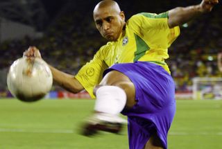 Roberto Carlos in action for Brazil against Belgium at the 2002 World Cup.