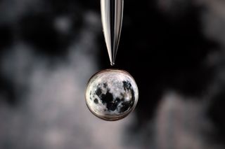 The moon in a water droplet.