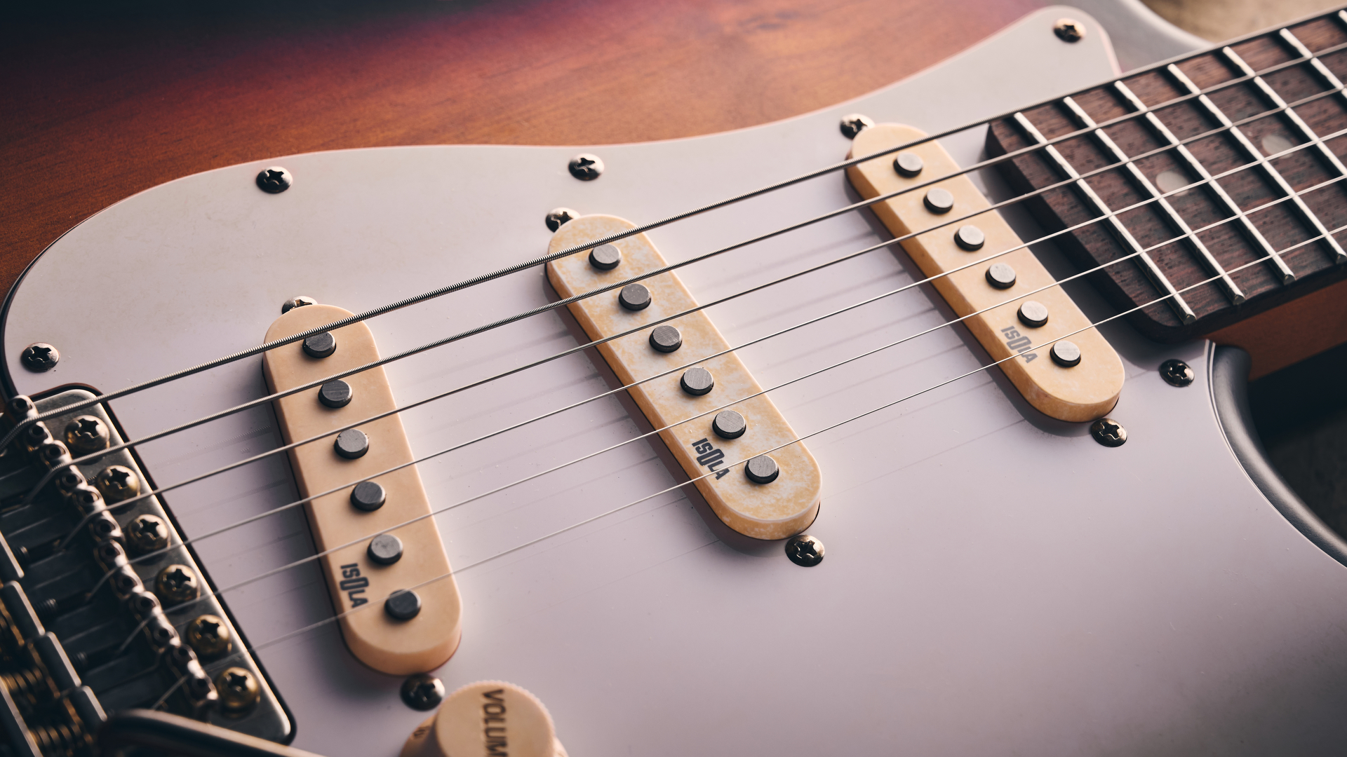 Close up of the three single coil pickups on the Harley Benton ST-62HA electric guitar