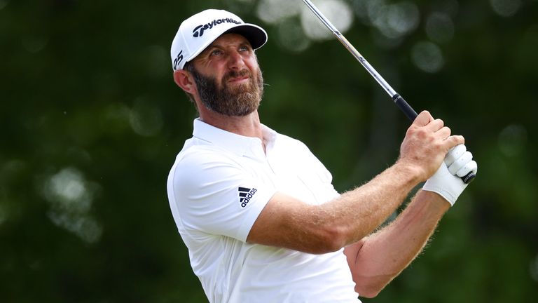 Dustin Johnson plays a tee shot during the second round of the 2022 US Open