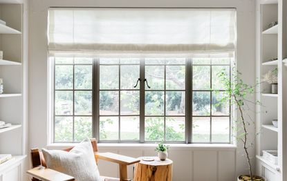 a roman blind in a window of a modern home