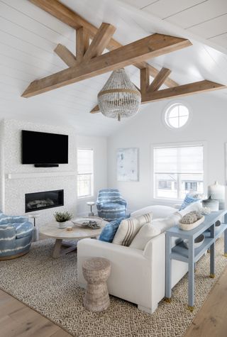 blue and white coastal style living room with tv