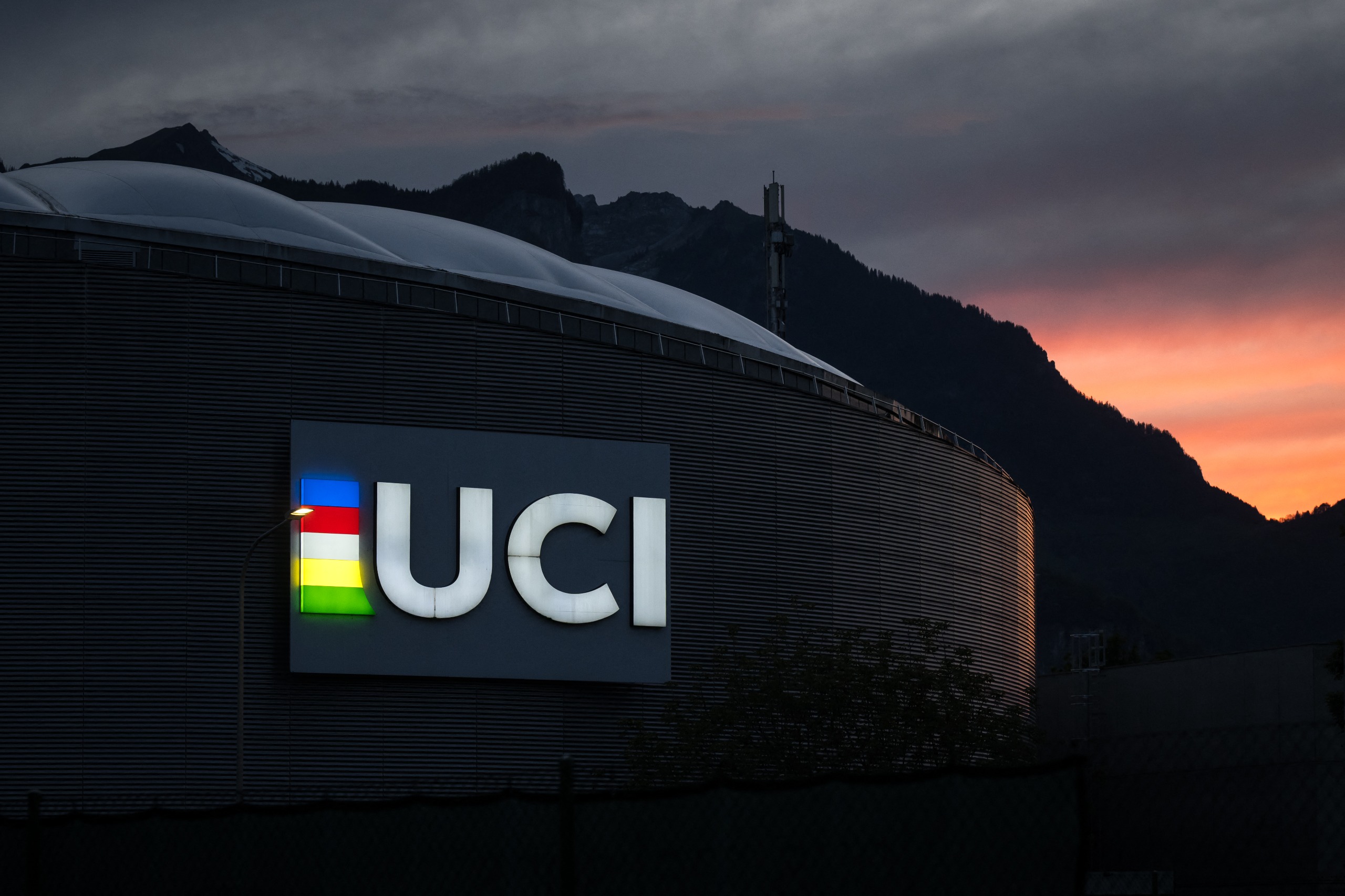 The UCI logo lit up on its headquarters