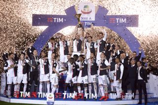 Juventus players celebrate after winning the Serie A title in 2019.