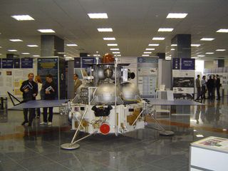 This is a full-scale mockup of Russia's Phobos-Grunt. The spacecraft will collect samples of soil on Mar's moon Phobos and to bring the samples back to Earth for detailed study.