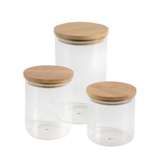 Cut out of glass storage jars with bamboo lids