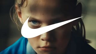 A screenshot from a Nike advert showing a girl looking aggressive