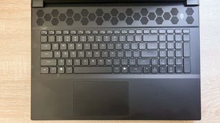 Alienware m18 review unit on desk, keyboard in focus