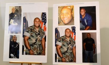 Pictures provided by the LAPD of alleged suspect Christopher Dorner are displayed during a briefing on Feb. 7.