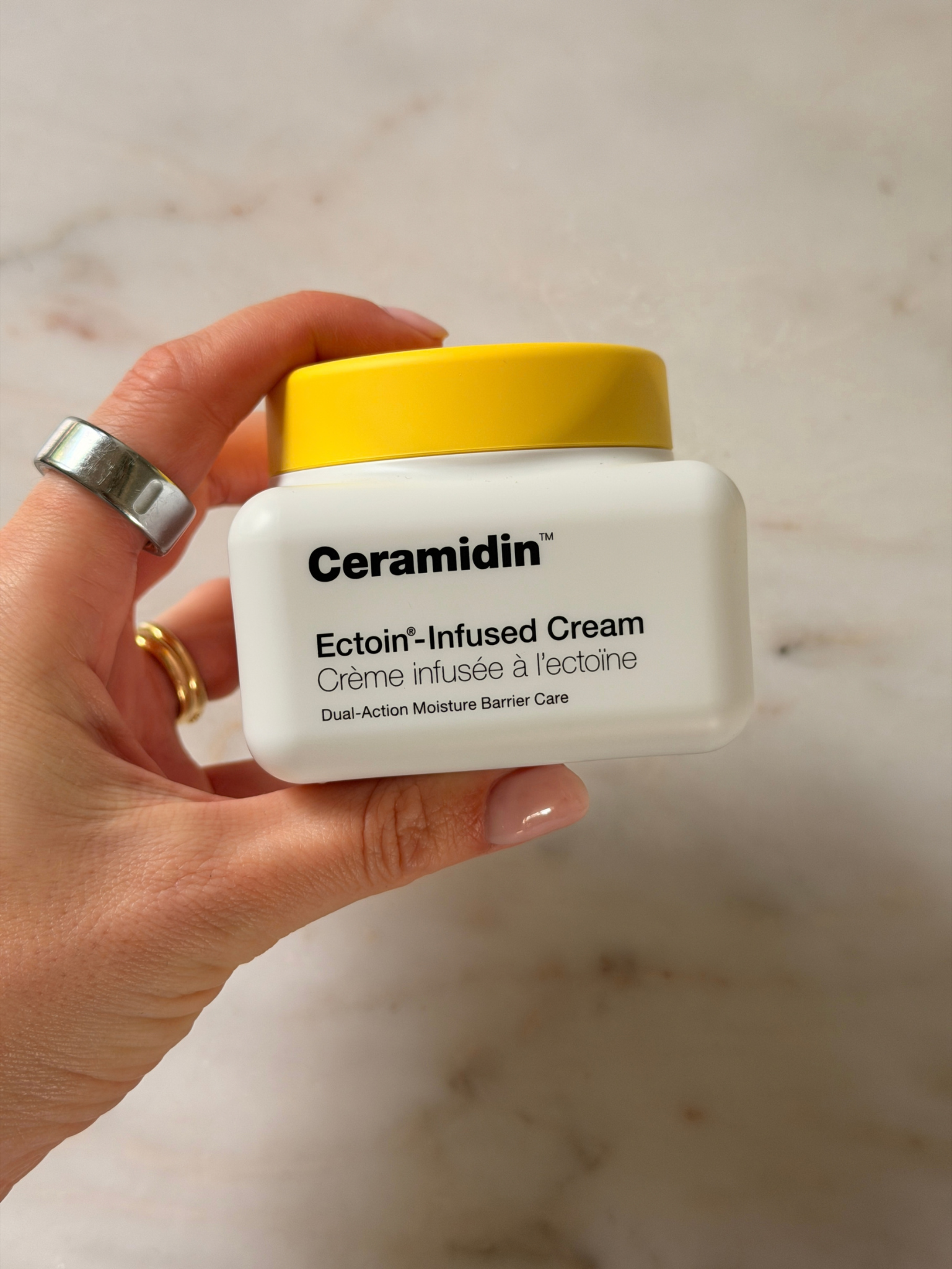 Freelance beauty editor Grace Day holding the Dr. Jart+ moisturiser