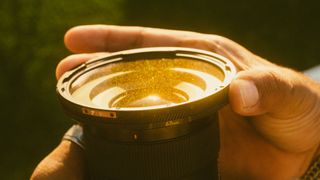 A retro-looking photograph of the PolarPro CineGold lens filter