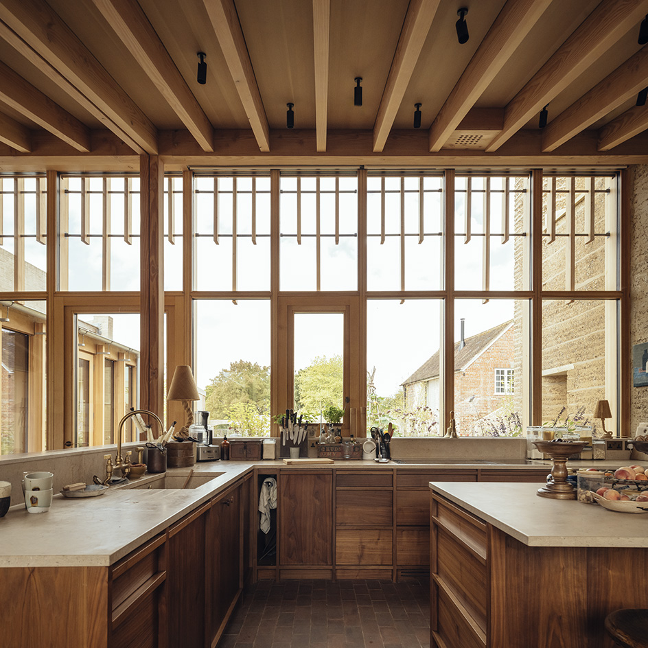 view of Rammed Earth House by Tuckey Design Studio with tactile walls and earth tones