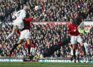 Alan Smith scores for Leeds United against Manchester United in 2004.