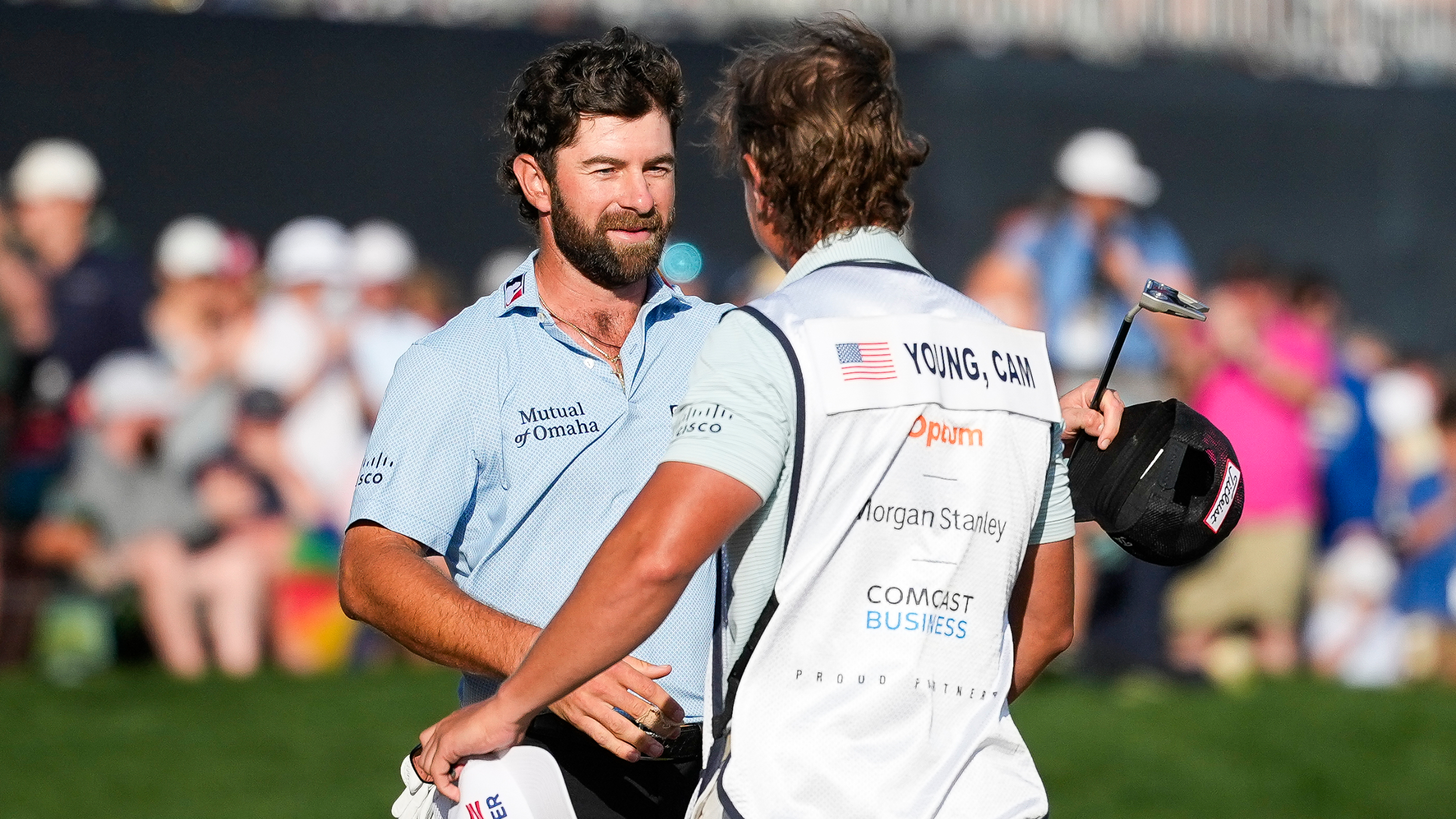 Cameron Young and his caddie celebrate winning The Players Championship    