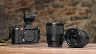 New Leica 35 and 50mm Sl lenses on a table