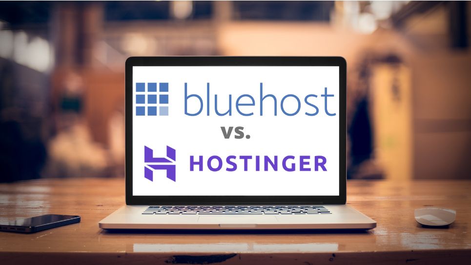 Bluehost and Hostinger logo on a laptop screen on a desk