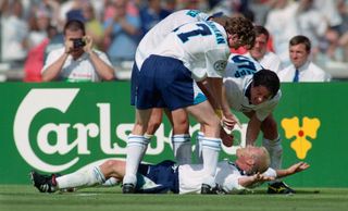 Paul Gascoigne and England team-mates celebrate in the "Dentist's Chair" after the midfielder's goal against Scotland at Euro 96.