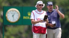 Thriston Lawrence speaking to his caddie at the 2025 US Open