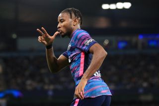 Christopher Nkunku celebrates his third goal for RB Leipzig against Manchester City in the Champions League group stages in September 2021.