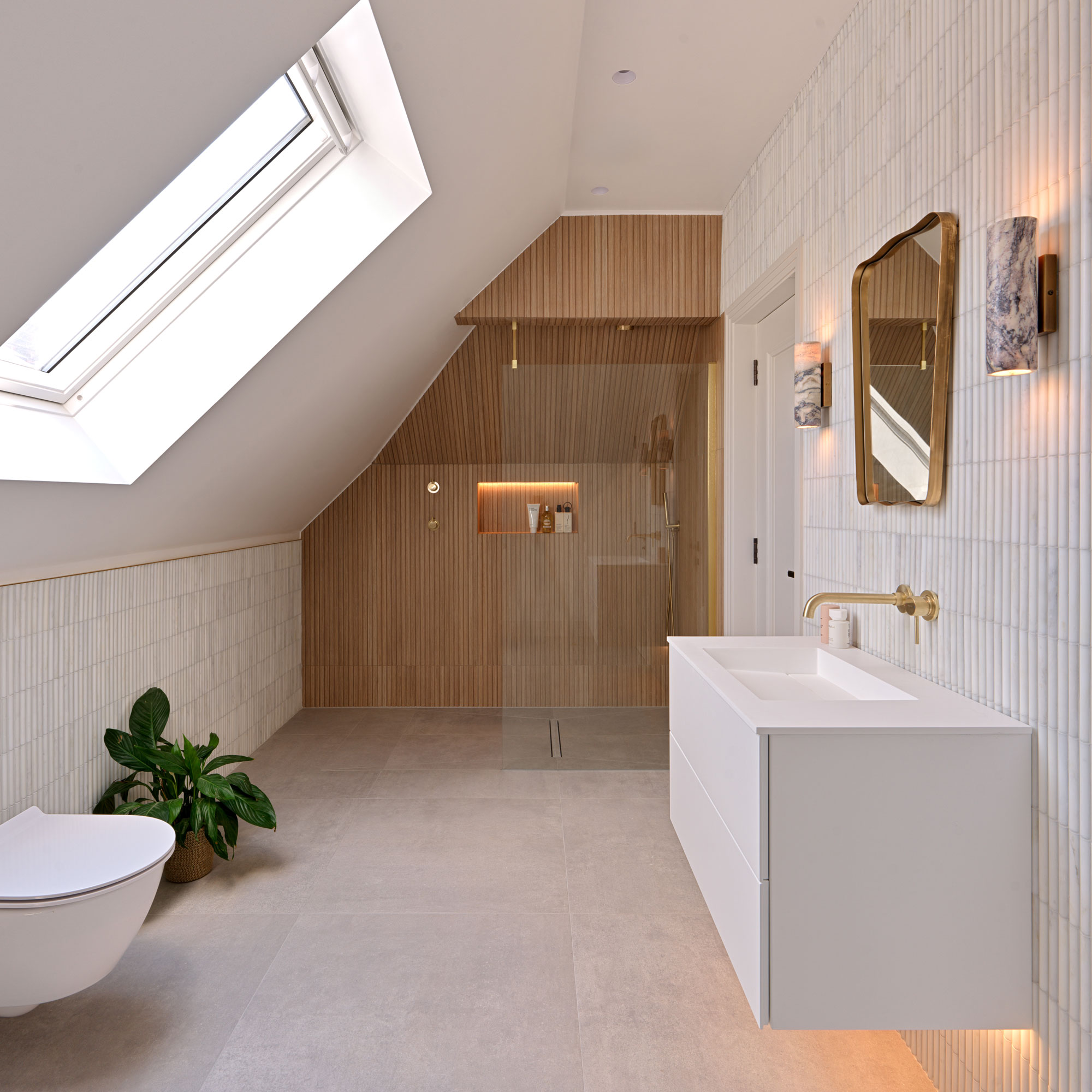 White bathroom with wood clad shower, bamboo tiles and white vanity