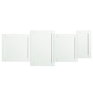 White, primed, Shaker-style cabinet doors ready for finishing.
