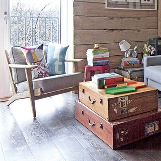 living room with old boxes and colourful trays