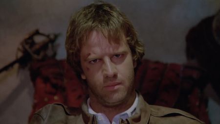 Scuffed-up Christopher Lambert in Highlander