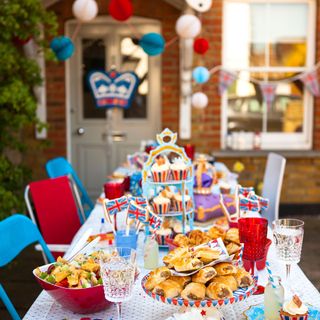 Dinning table filled with party decorations