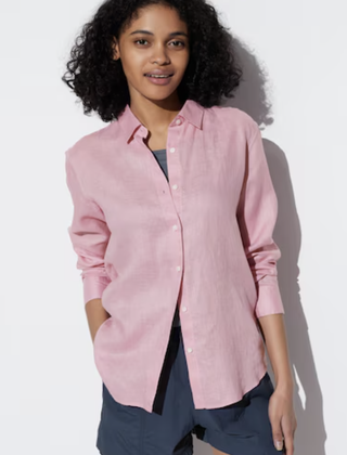 a woman wearing a linen shirt