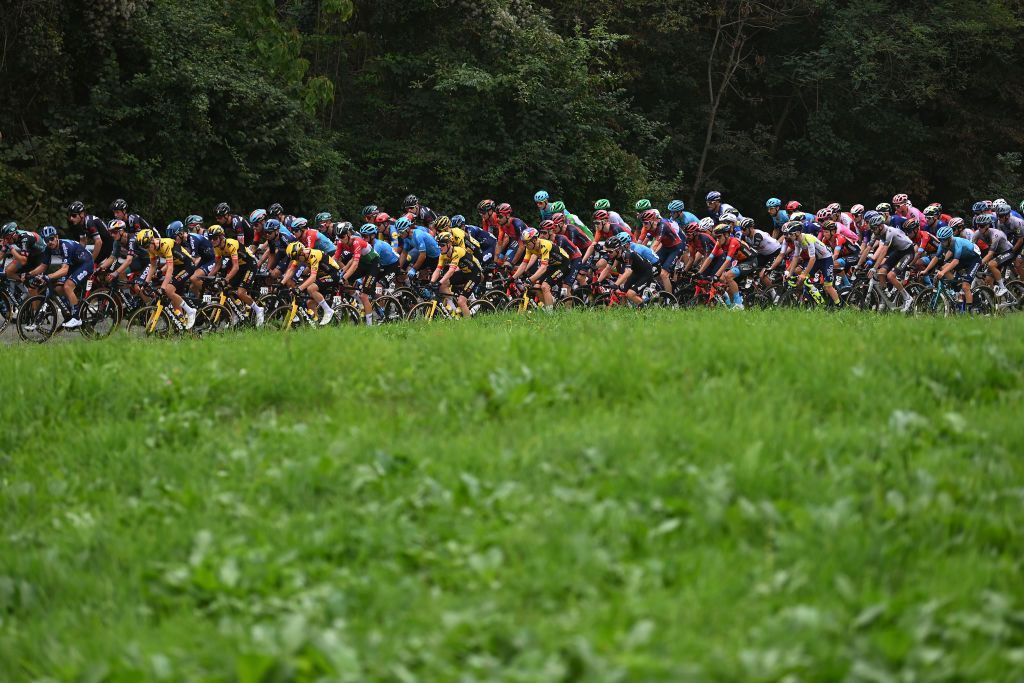FAVRIA ITALY OCTOBER 05 LR Wout Van Aert of Belgium and Team JumboVisma Salvatore Puccio of Italy and Team INEOS Grenadiers Nils Brun of Switzerland and Tudor Pro Cycling Team and a general view of the peloton competing during the 107th Gran Piemonte 2023 a 152km one day race from Borgofranco dIvrea to Favria on October 05 2023 in Favria Italy Photo by Tim de WaeleGetty Images