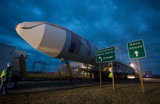 An Orbital Sciences Corp. Antares rocket is seen as it is rolled out to launch Pad-0A at NASA's Wallops Flight Facility, Sunday, Jan. 5, 2014 for a planned Jan. 8 launch from Wallops Island, Va. The Antares will launch a Cygnus spacecraft on a cargo resu