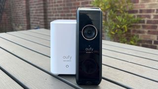 The Eufy Video Doorbell Dual next to the base station
