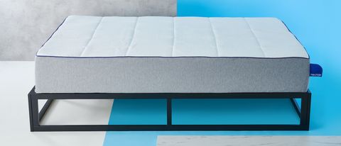 The Nectar Memory Foam Mattress photographed on a metal black bed frame during the review process