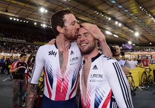 Bradley Wiggins kisses the head of Mark Cavendish after the duo claimed a second madison world title, eight years on from their Manchester win in 2008
