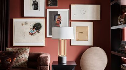 A contemporary living room filled with eclectic furniture, accessories, and wall art