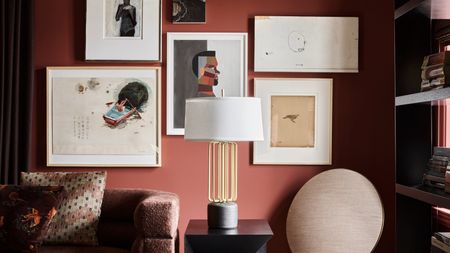 A contemporary living room filled with eclectic furniture, accessories, and wall art