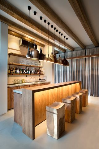 a wet bar with seating