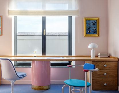 A study room with a pink and blue palette
