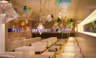 Titled ’Crystal Atmosphere,’ the installation featured Fjellman’s signature chandeliers