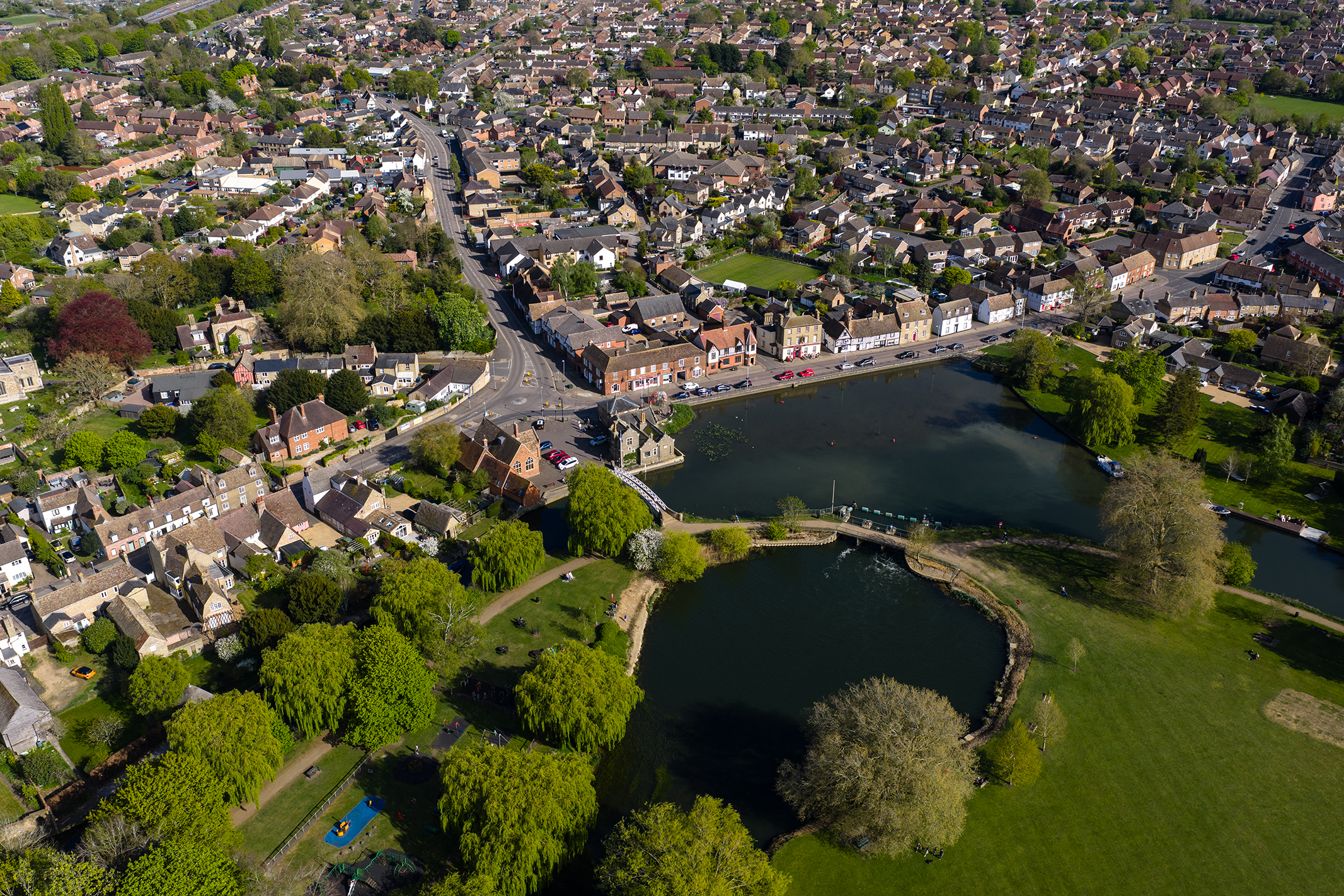 Photo of a riverside town taken with the DJI Mavic 4 Pro